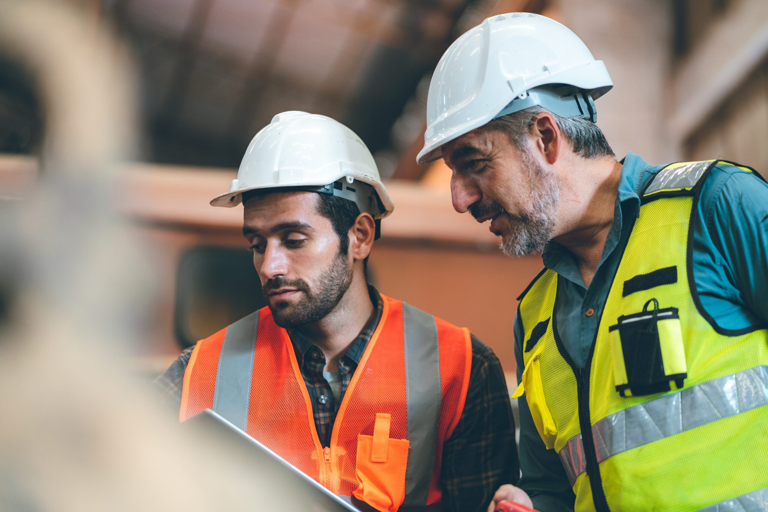 Teamwork,Men,In,Construction,Site,,Two,Civil,Engineer,Or,Professional